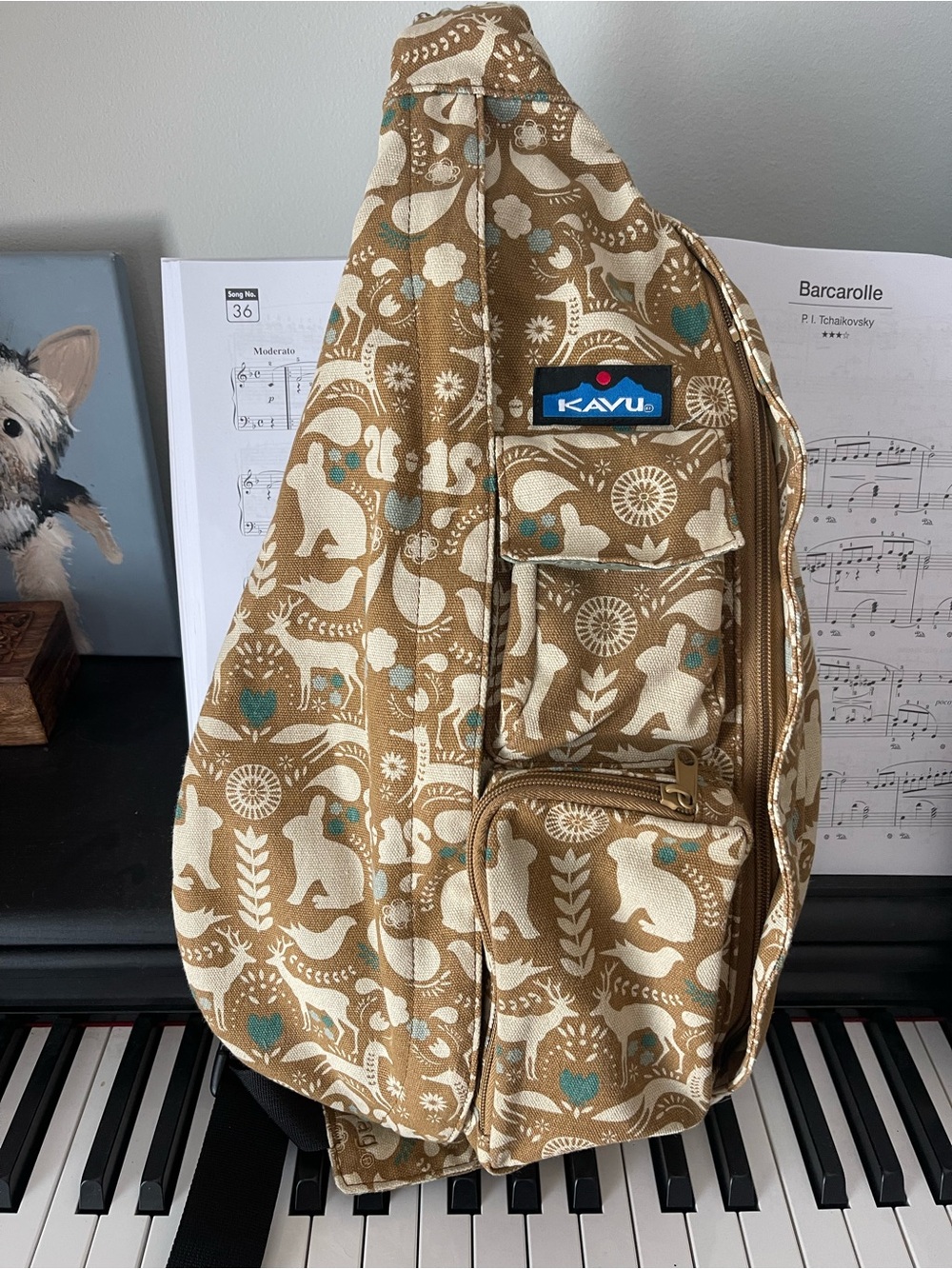 Kavu Tan & Cream Sling Bag with Teal Accent Print